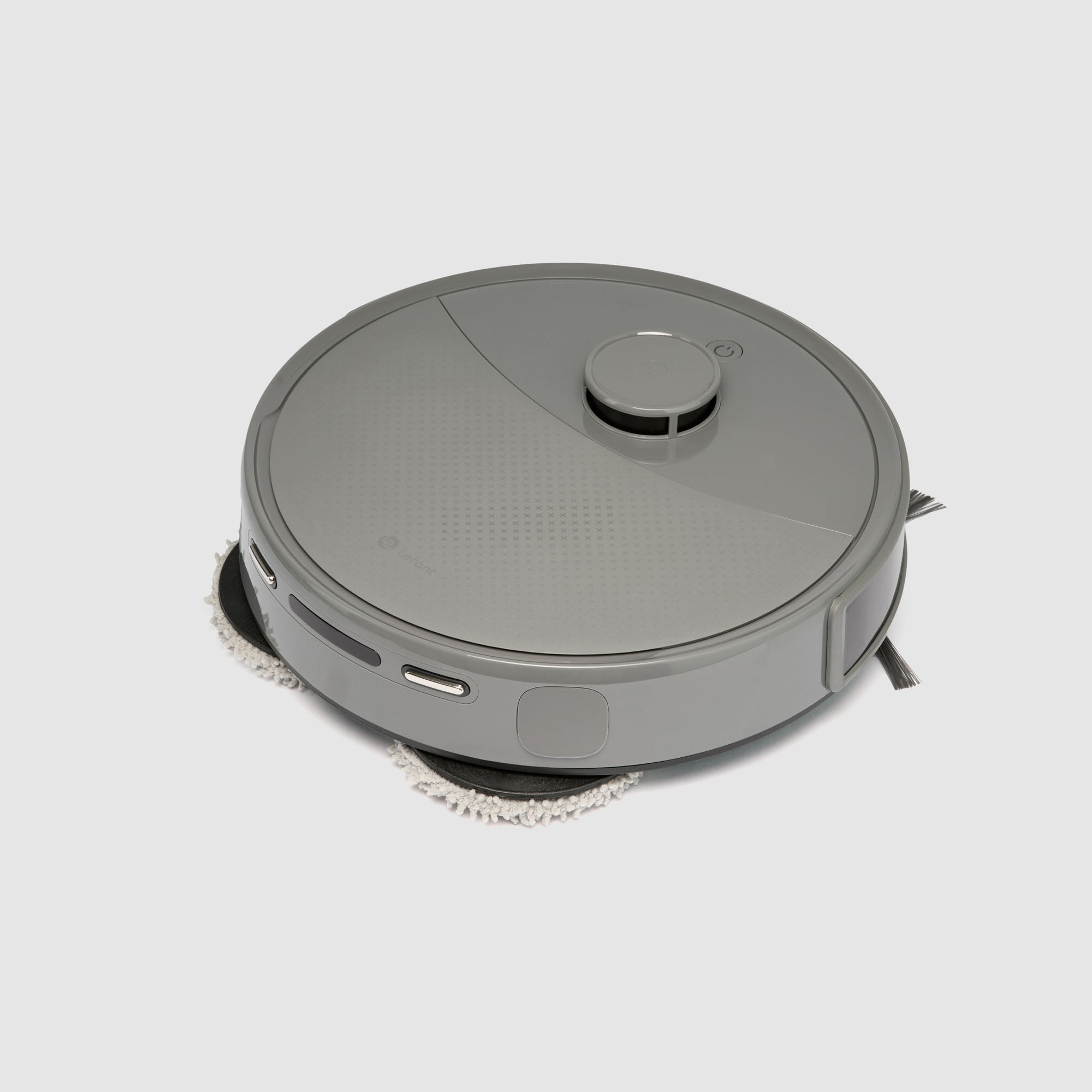 Gray robot vacuum cleaner on a white background